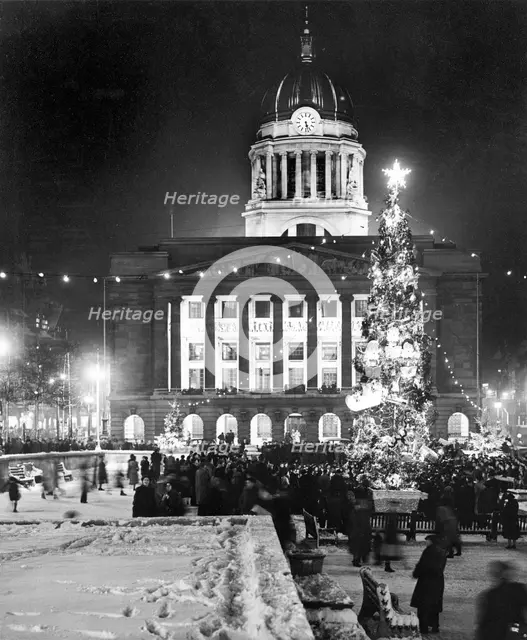 Christmas illuminations in the Market Square, Nottingham, Nottinghamshire, c1950s. Creator: Edgar Lloyd.