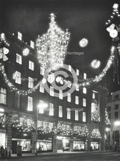 Christmas illuminations on Regent Street, West End, looking to Austin Reed at 103-113, London, 1970. Creator: Unknown.