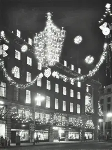 Christmas illuminations on Regent Street, West End, looking to Austin Reed at 103-113, London, 1970. Creator: Unknown