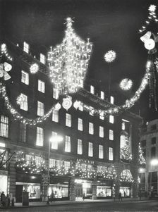 Christmas illuminations on Regent Street, West End, looking to Austin Reed at 103-113, London, 1970. Creator: Unknown