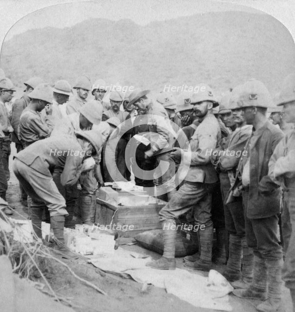 'Christmas presents from home, to the troops with Methuen at Modder River', South Africa, 1900.Artist: Underwood & Underwood