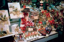 Christmas presents in a shop window, Paris, France. Creator: Peter Thompson