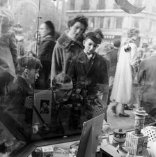 Christmas shoppers outside a toyshop, London, 1957. Creator: Henry Grant