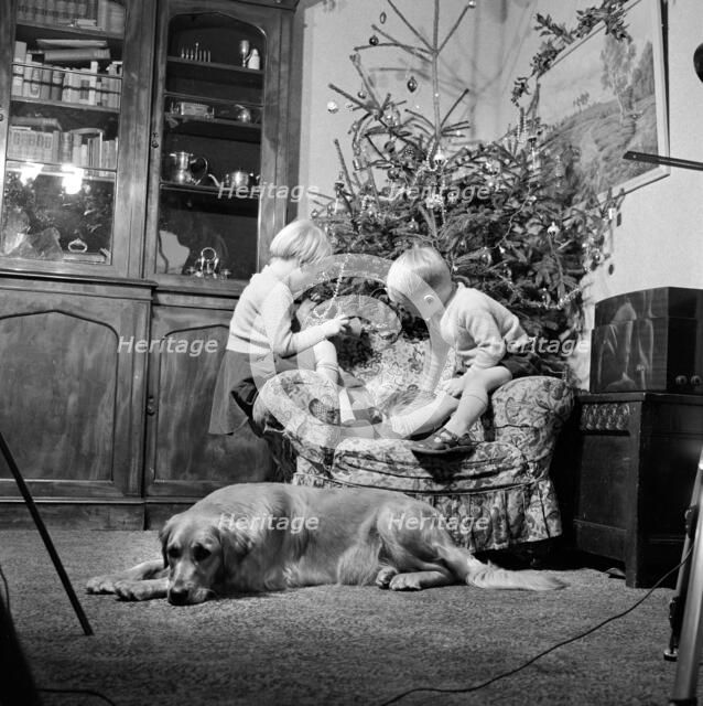 Christmas time, 1960. Artist: John Gay.