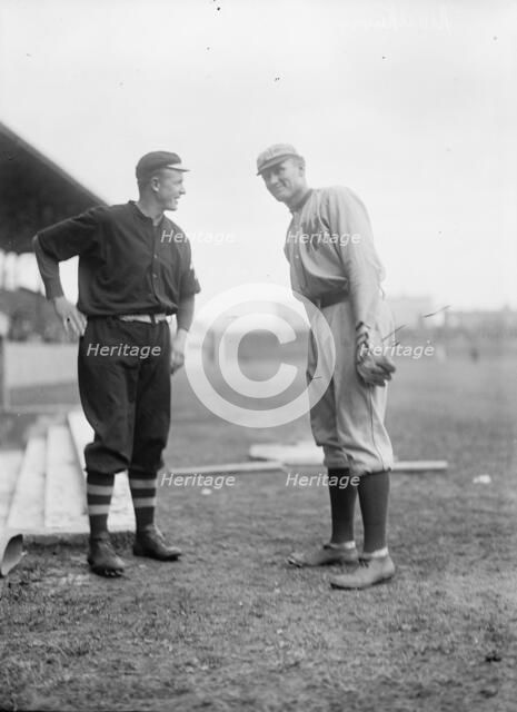 Christy Mathewson And Walter Johnson, New York Nl (Black) And Washington Al (Baseball), 1912. Creator: Harris & Ewing.