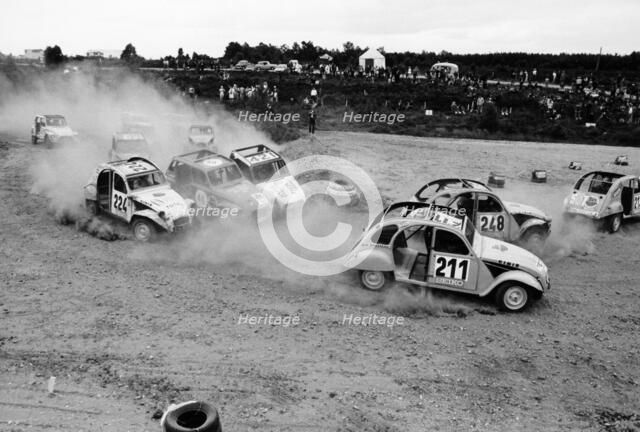 Citroën 2CVs at an auto-cross. Artist: Unknown