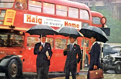 City gents sheltering under umbrellas in the rain, London, 1965. Artist: Unknown