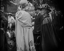 Civilians on the Street Wearing Evening Outfits, Hats and Top Hats, 1920. Creator: British Pathe Ltd