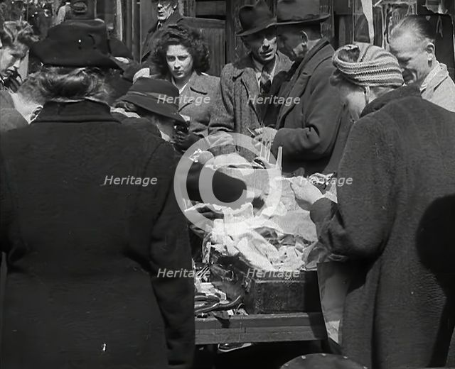 Civilians at a Market, 1942. Creator: British Pathe Ltd.