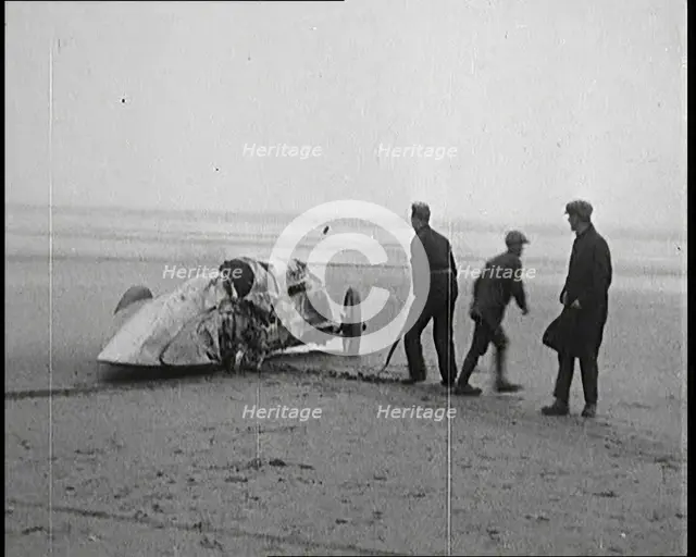 Civilians Attending the Wreckage of a Speed Car, 1927. Creator: British Pathe Ltd.