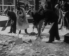 Civilians Clearing up Bomb Damage, 1940. Creator: British Pathe Ltd
