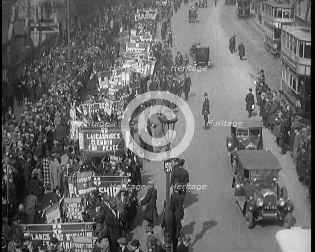 Civilians Demonstrating in London Against Continuous Strikes in the Rain. Signs Read..., 1926. Creator: British Pathe Ltd.