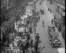 Civilians Demonstrating in London Against Continuous Strikes in the Rain. Signs Read..., 1926. Creator: British Pathe Ltd