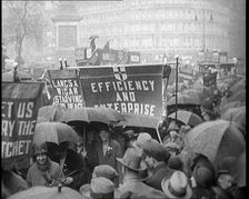 Civilians Demonstrating in London Against Continuous Strikes in the Rain. Signs Read..., 1926. Creator: British Pathe Ltd