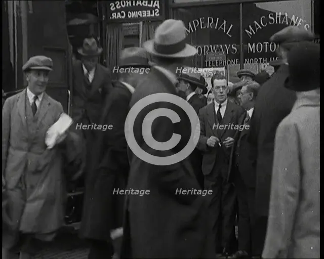 Civilians Disembarking from a Bus On the Streets of London, 1920s. Creator: British Pathe Ltd.