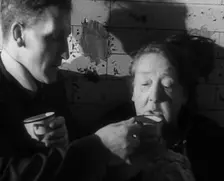 Civilians Drinking Hot Drinks While Sheltering from Bombs in the London Underground, 1940. Creator: British Pathe Ltd