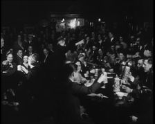 Civilians Drinking in a Bar in Celebration, 1930s. Creator: British Pathe Ltd