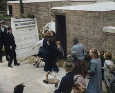 Civilians Entering an Air Raid Shelter to Escape German Shelling, 1940. Creator: British Pathe Ltd
