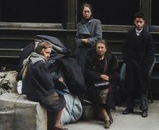 Civilians Surrounded by Bombed Out Buildings, 1940. Creator: British Pathe Ltd
