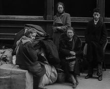 Civilians Surrounded by Bombed Out Buildings, 1940. Creator: British Pathe Ltd