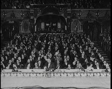 Civilians Seated Waiting For a Play To Begin As the Curtains Open, 1920s. Creator: British Pathe Ltd