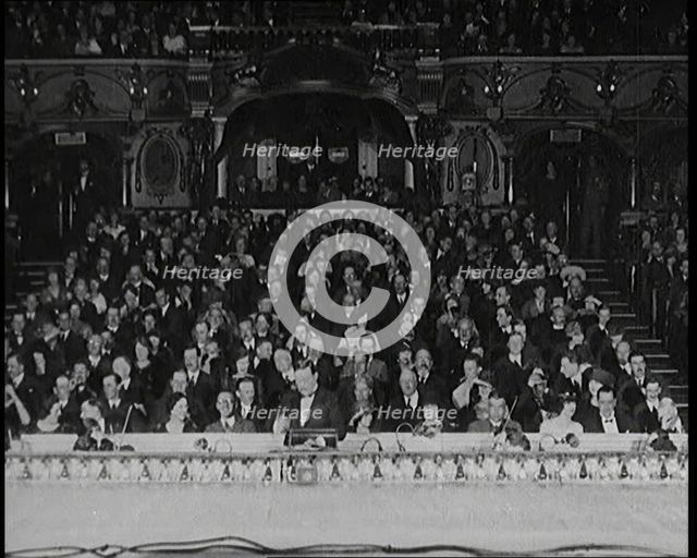 Civilians Seated Waiting For a Play To Begin As the Curtains Open, 1920s. Creator: British Pathe Ltd.