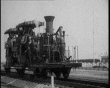 Civilians Wearing Period Costumes Travelling On an Old Locomotive, 1920s. Creator: British Pathe Ltd