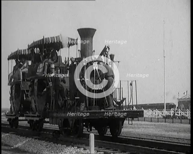 Civilians Wearing Period Costumes Travelling On an Old Locomotive, 1920s. Creator: British Pathe Ltd.