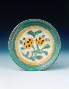 Cizhou-type saucer with pomegranate spray in polychrome glazes, Jin dynasty, China, 1115-1234. Creator: Unknown