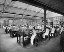 Cigarette production at the Teofani tobacco factory, Chryssel Road, Brixton, London, September 1916. Artist: H Bedford Lemere