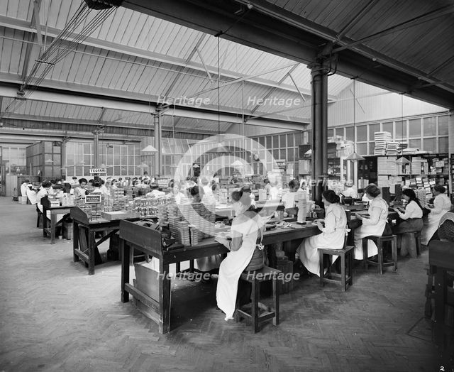 Cigarette production at the Teofani tobacco factory, Chryssel Road, Brixton, London, September 1916. Artist: H Bedford Lemere.