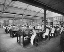 Cigarette production at the Teofani tobacco factory, Chryssel Road, Brixton, London, September 1916. Artist: H Bedford Lemere