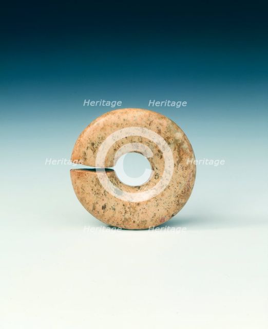 Circular jade bead, neolithic, Chahai type, northern China, c4700-3000 BC. Artist: Unknown
