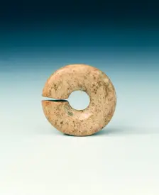 Circular jade bead, neolithic, Chahai type, northern China, c4700-3000 BC. Creator: Unknown