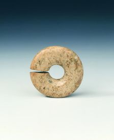 Circular jade bead, neolithic, Chahai type, northern China, c4700-3000 BC