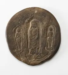 Circular plaque with Buddhist trinity on obverse..., Period of Division, Dated 500 CE. Creator: Unknown