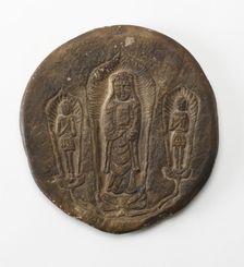 Circular plaque with Buddhist trinity on obverse..., Period of Division, Dated 500 CE. Creator: Unknown