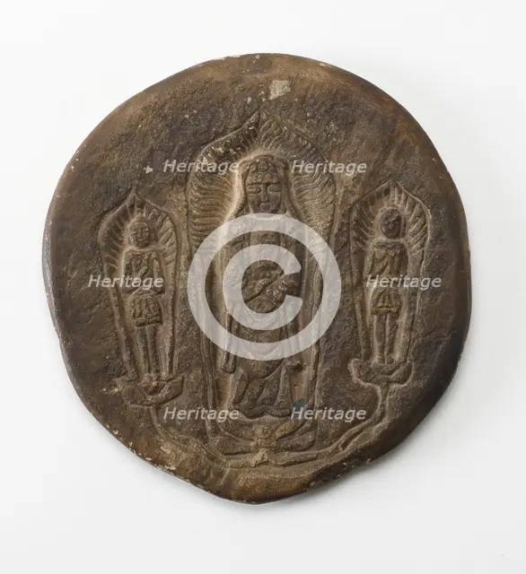 Circular plaque with Buddhist trinity on obverse..., Period of Division, Dated 500 CE. Creator: Unknown.