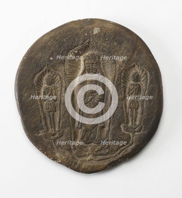 Circular plaque with Buddhist trinity on obverse..., Period of Division, Dated 500 CE. Creator: Unknown.