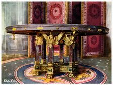 Circular table and folding screen, 1911-1912.Artist: Edwin Foley