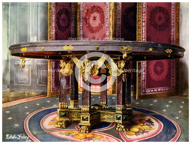 Circular table and folding screen, 1911-1912.Artist: Edwin Foley