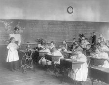 Class in science - studying water vapor, 2nd Division elementary school, Washington, D.C., (1899?). Creator: Frances Benjamin Johnston