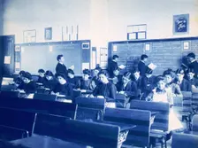 Classroom at the Indian Industrial School, Carlisle, Pennsylvania, between 1901 and 1903. Creator: Frances Benjamin Johnston