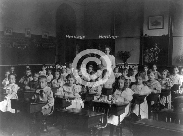 Classroom scenes in Washington, D.C. public schools: general classroom scenes, 1st Division, (1899?) Creator: Frances Benjamin Johnston.