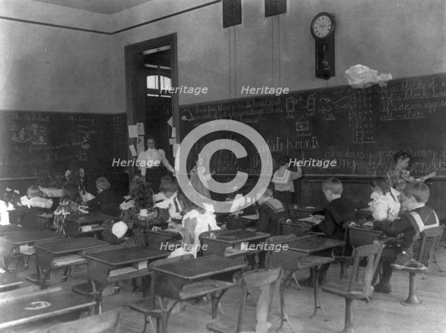 Classroom scenes in Washington, D.C. public schools: general classroom scenes, 1st Division, (1899?) Creator: Frances Benjamin Johnston.