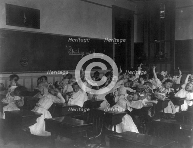 Classroom scenes in Washington, D.C. public schools - stretching and yawning exercise..., (1899?). Creator: Frances Benjamin Johnston.