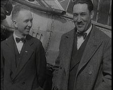 Clarence Duncan Chamberlin And Bertrand Blanchard Acosta Talking in Front of an Airplane, 1920s. Creator: British Pathe Ltd