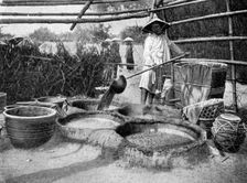 Clarifying sugar cane juce, Annam, Vietnam, 1922