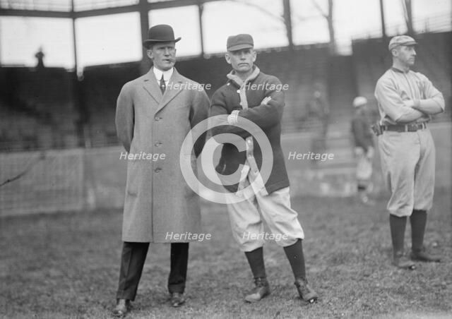 Clark Griffith, right, 1912. Creator: Harris & Ewing.