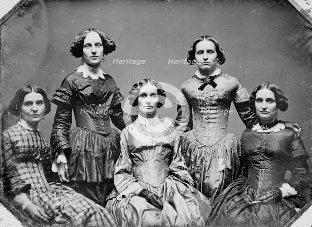 Clark sisters, five women, three-quarter length portraits, all facing front, between 1840 and 1860. Creator: Unknown.
